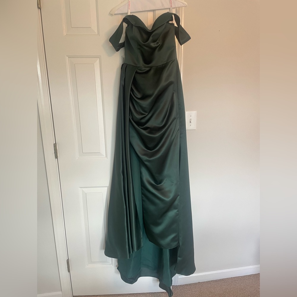 Dress used for bridal party once. Dry cleaned and has been unused since.